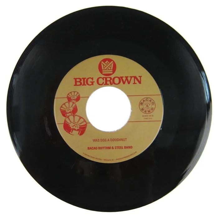 Bacao Rhythm & Steel Band: Love Like This / Was Dog A Doughnut Vinyl 7″ on Sale