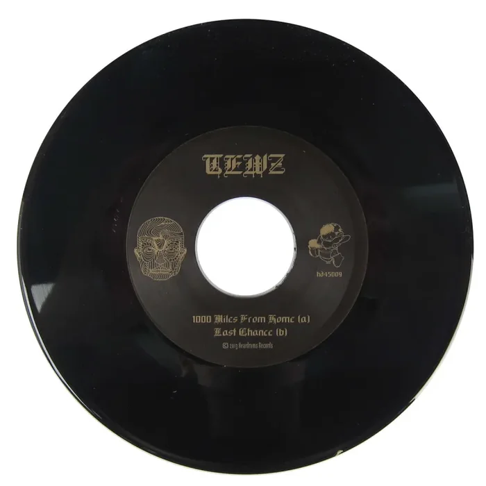 Tewz: 1000 Miles From Home Vinyl 7″
